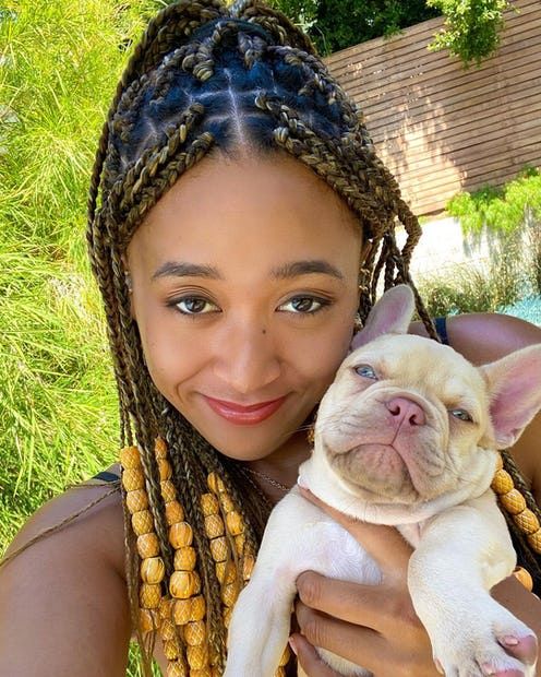 naomi holding a dog